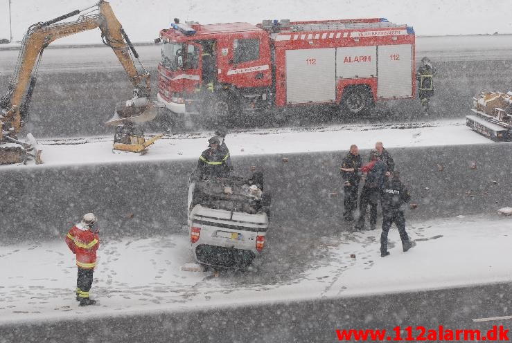 Havnet på taget. Motorvejen E45 ved Vejle. 16/03-2013. Kl. 13:59.