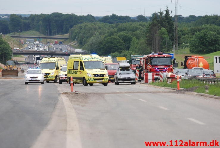 3 biler kørt sammen på Motorvejen. Motorvejen E45 ved Vejle. 04/07-2013. Kl. 13:37.