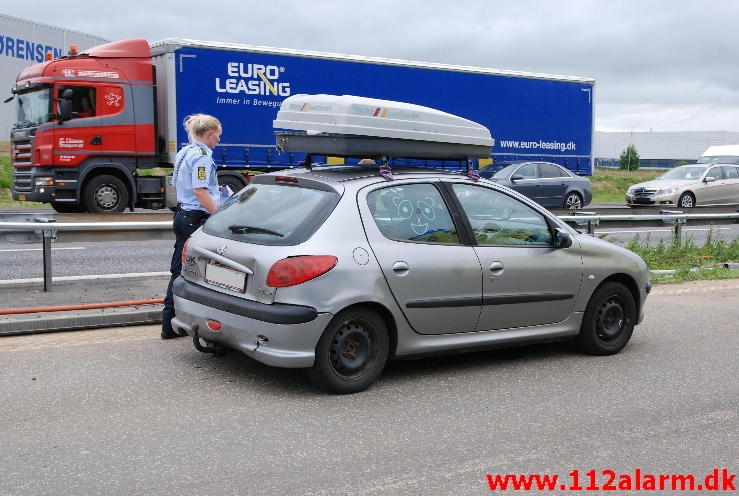 3 biler kørt sammen på Motorvejen. Motorvejen E45 ved Vejle. 04/07-2013. Kl. 13:37.