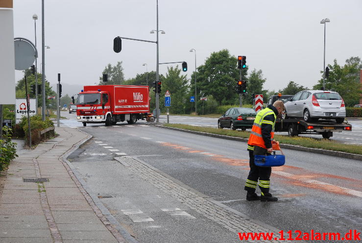 Mindre spild. Damhaven 13 i Vejle. 01/08-2013. Kl. 11:53.