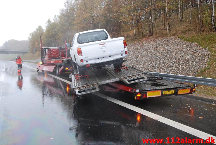 3 lastbiler var køre sammen på motorvej E45. Mellem Horsensvej og Vejlefjordbroen. 28/10-2013. Kl. 09:57.