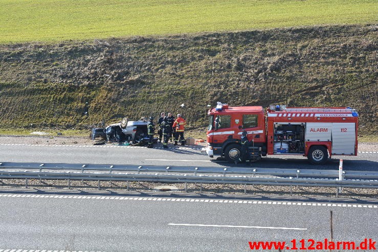 FUH med fastklemt. Midtjyske Motorvej ind mod Vejle. 12/03-2015. Kl. 14:03.