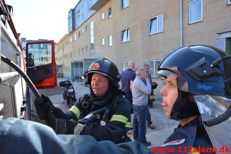 Brand i en Lejlighed. Løget Center 69 i Vejle.  09/06-2015. Kl. 10:45.