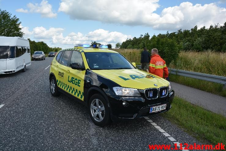 FUH med fastklemt. Viborg Hovedvej 91 Tørring. 18/07-2015. Kl. 11:18.