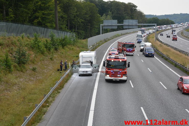 Bilbrand. Motorvejen E45 lige efter broen. 10/08-2015. KL. 12:29.