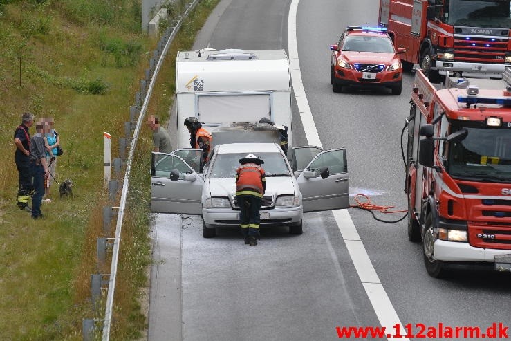 Bilbrand. Motorvejen E45 lige efter broen. 10/08-2015. KL. 12:29.