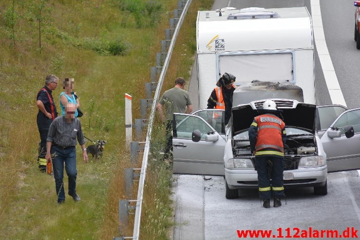 Bilbrand. Motorvejen E45 lige efter broen. 10/08-2015. KL. 12:29.