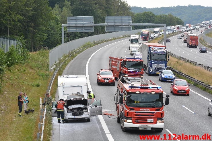 Bilbrand. Motorvejen E45 lige efter broen. 10/08-2015. KL. 12:29.