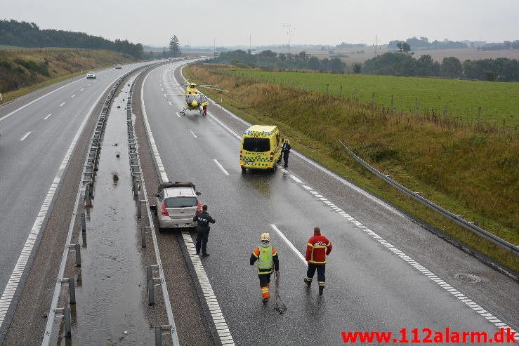 Fuh med fastklemt. Motorvejen fra Give mod Vejle. 22/09-2015. Kl. 11:12.