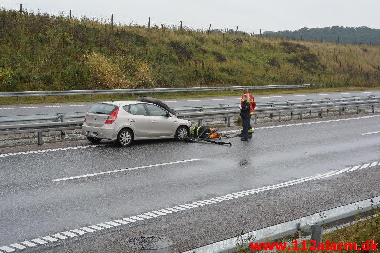 Fuh med fastklemt. Motorvejen fra Give mod Vejle. 22/09-2015. Kl. 11:12.