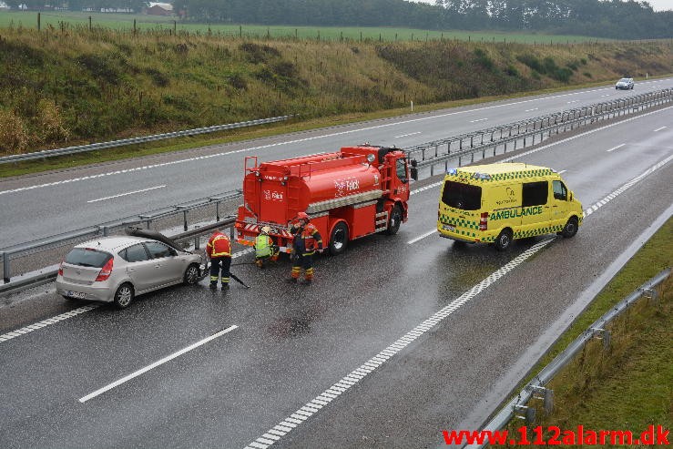 Fuh med fastklemt. Motorvejen fra Give mod Vejle. 22/09-2015. Kl. 11:12.