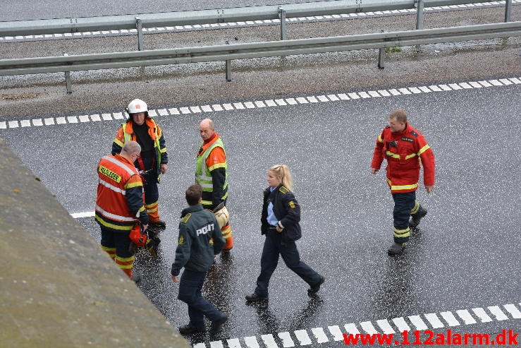 Fuh med fastklemt. Motorvejen fra Give mod Vejle. 22/09-2015. Kl. 11:12.