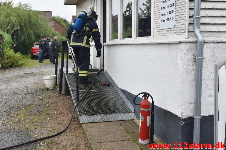 Brand i Butik. Borgergade i Brejning. 04/09-2016. Kl. 16:48.