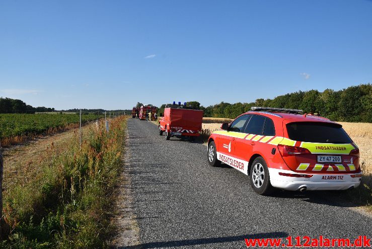 Brand i landbrugsredskab. Logslundvej i Tørring. 27/07-2018. Kl. 17:46.