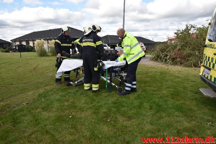 Kom i klemme under gravemaskine. Gimlevej i Vejle. 14/10-2020. Kl. 13:41.