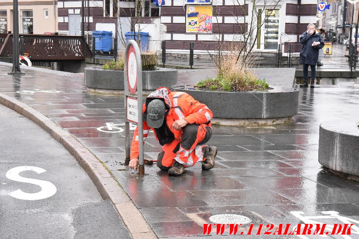 Ramt skilt og en lysregulering. Nørretorv i Vejle. 06/03-2024.